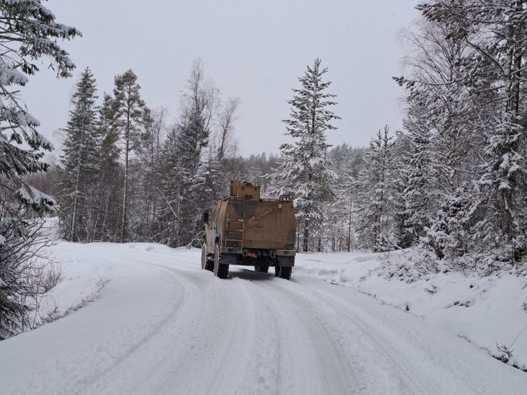 Armoured vehicle on a snow-covered track — Kongsberg, Norway (March 2025)